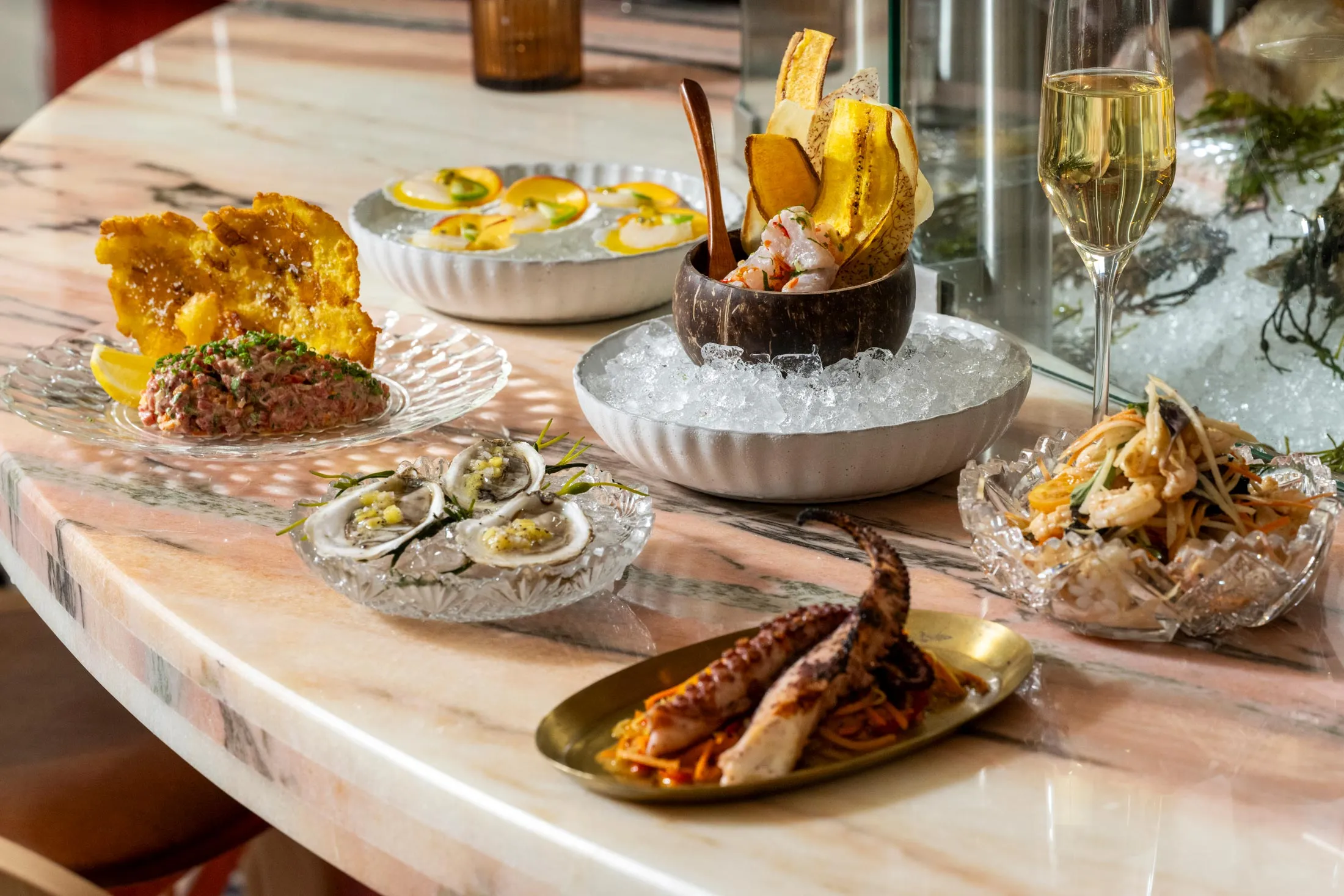 A spread at the Caribbean-accented Paya, where the food is “fun, but not gimmicky.”