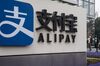 An Alipay sign outside an Ant Group Co. office building in Shanghai, China, on Thursday, Dec. 24, 2020. China kicked off an investigation into alleged monopolistic practices at Alibaba Group Holding Ltd. and summoned affiliate Ant Group to a high-level meeting over financial regulations, escalating scrutiny over the twin pillars of billionaire Jack Ma’s internet empire.