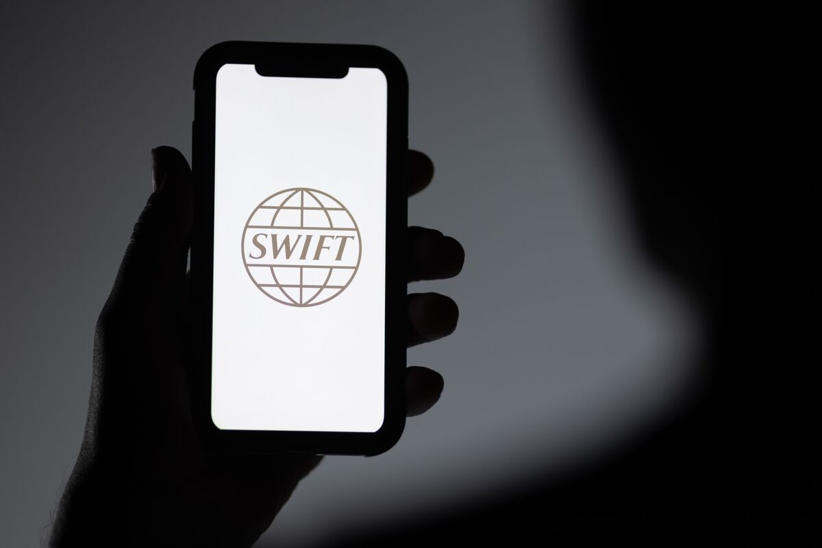 SWIFT is testing a blockchain project with crypto startup Symbiont to drive "efficiencies in communicating significant corporate events", like mergers (Katherine Doherty/Bloomberg)