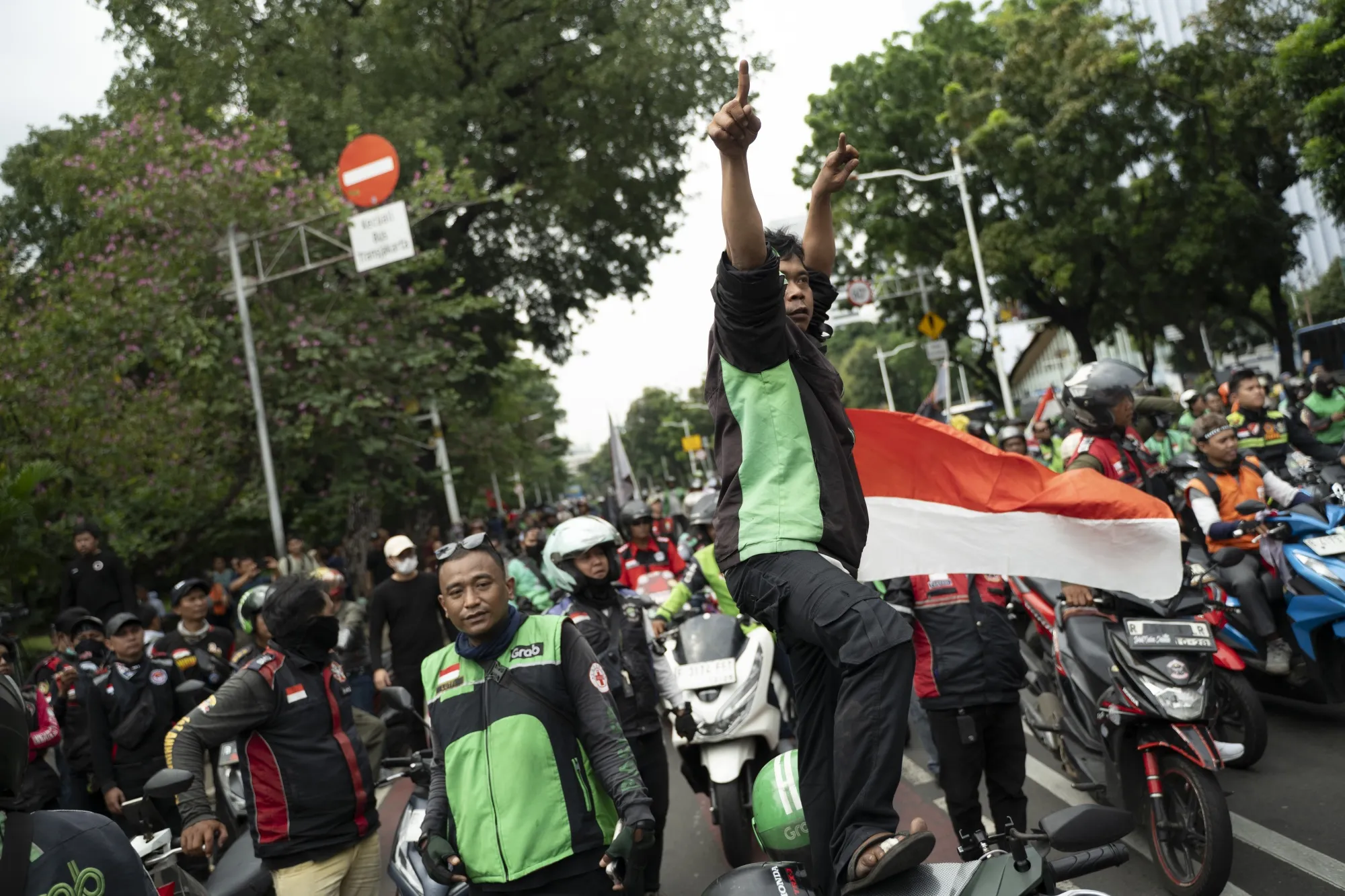 Ride-hailing app drivers protest in Jakarta on May 20.