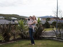 Jen Spears and her daughter Mia at their home in Tura Beach.