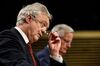 David Davis, U.K. exiting the European Union (EU) secretary, left, adjusts his spectacles as he stands beside Michel Barnier, chief negotiator for the European Union (EU).