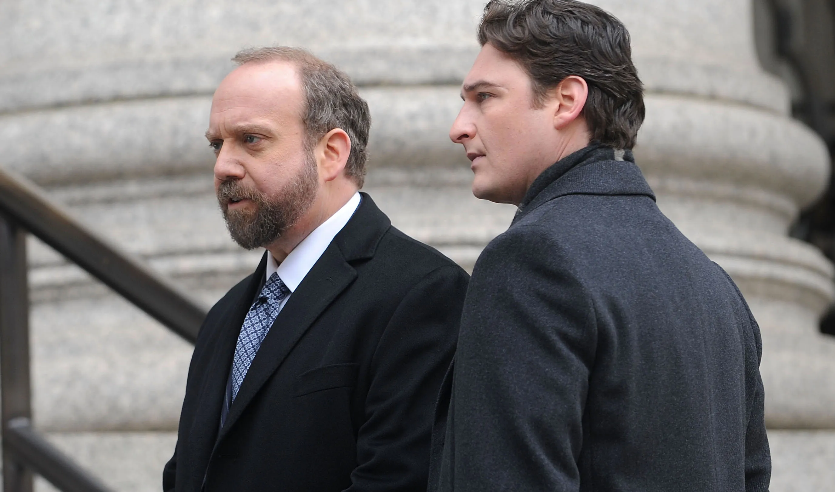 Actors Paul Giamatti and Toby Leonard Moore on the set of Billions.
