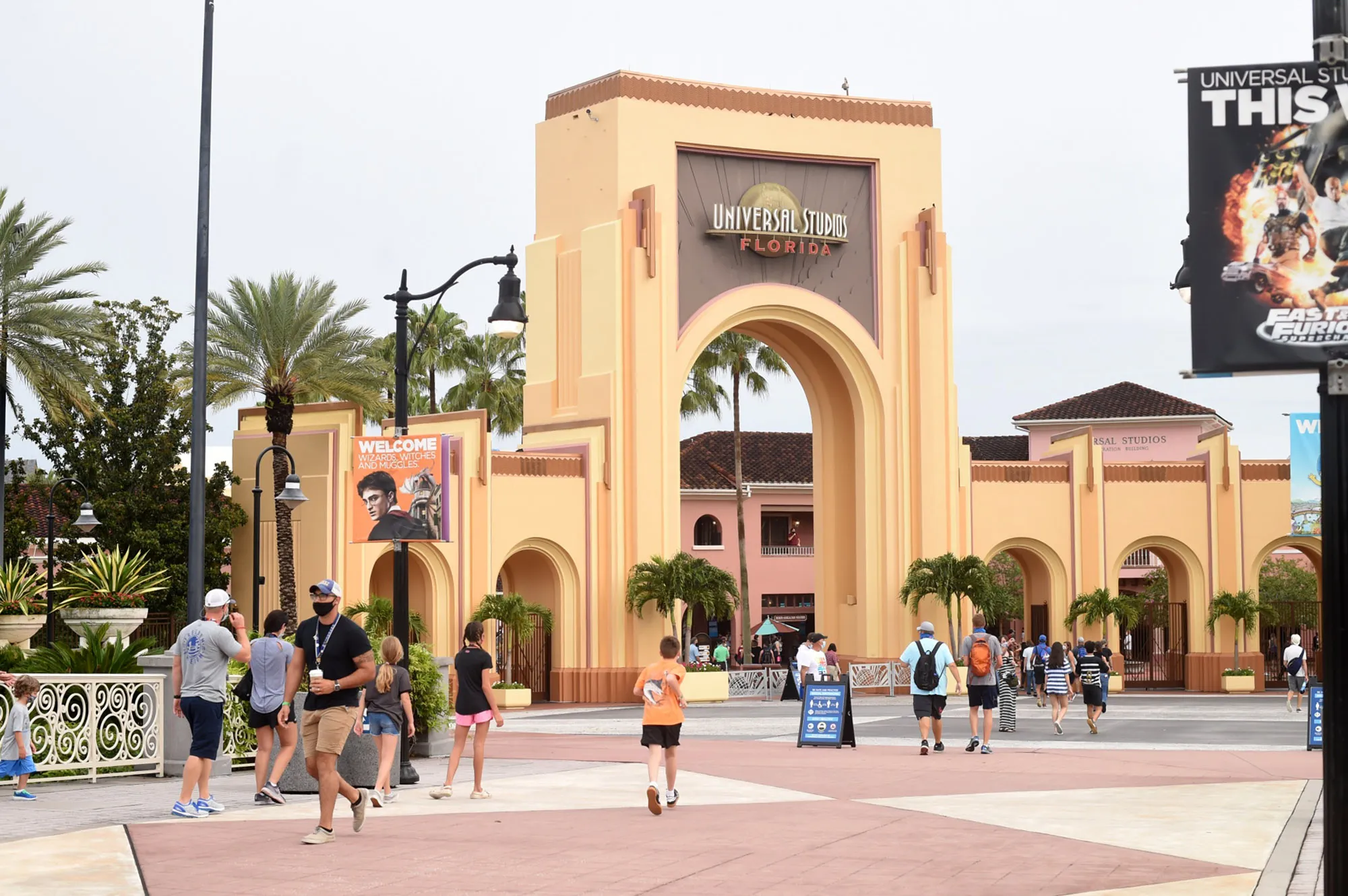 Park guests arrive at the Universal Studios theme park in Orlando on June 5.