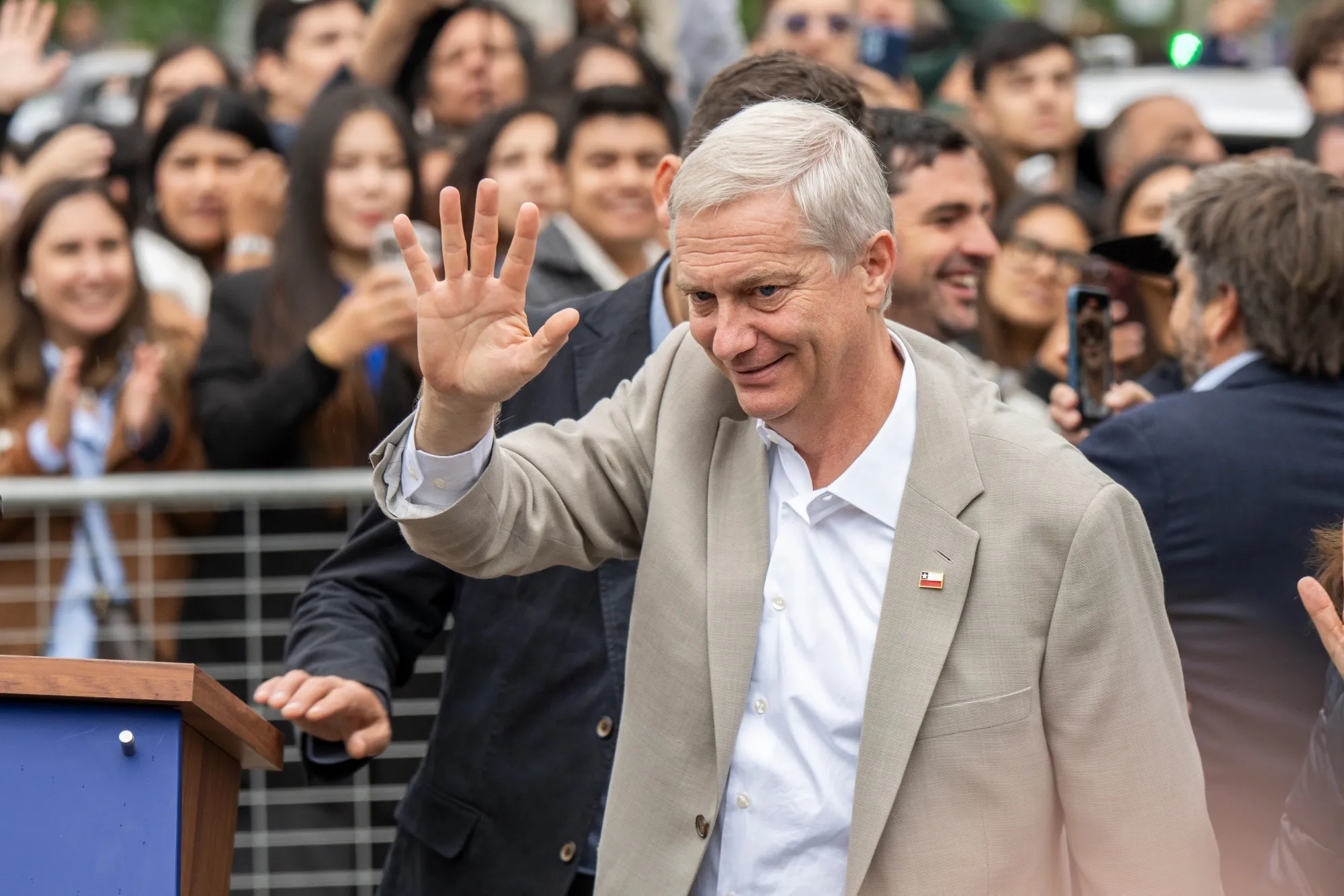 Jose Antonio Kas greets supporters at a polling station during the runoff election in Paine, Chile, on Sunday.