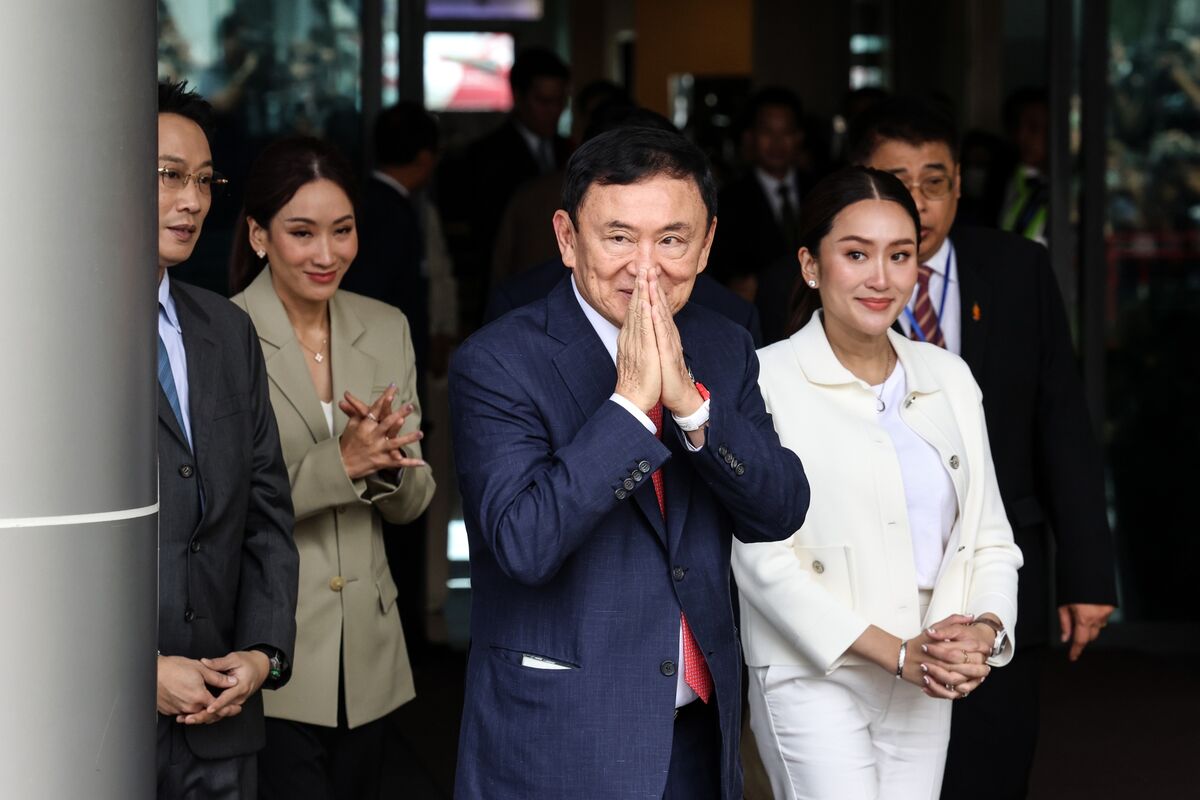 Former Thai Prime Minister Thaksin Returns from Exile After Deal with Former Thai Foes