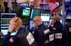 Traders work on the floor of the New York Stock Exchange (NYSE) in New York, U.S..