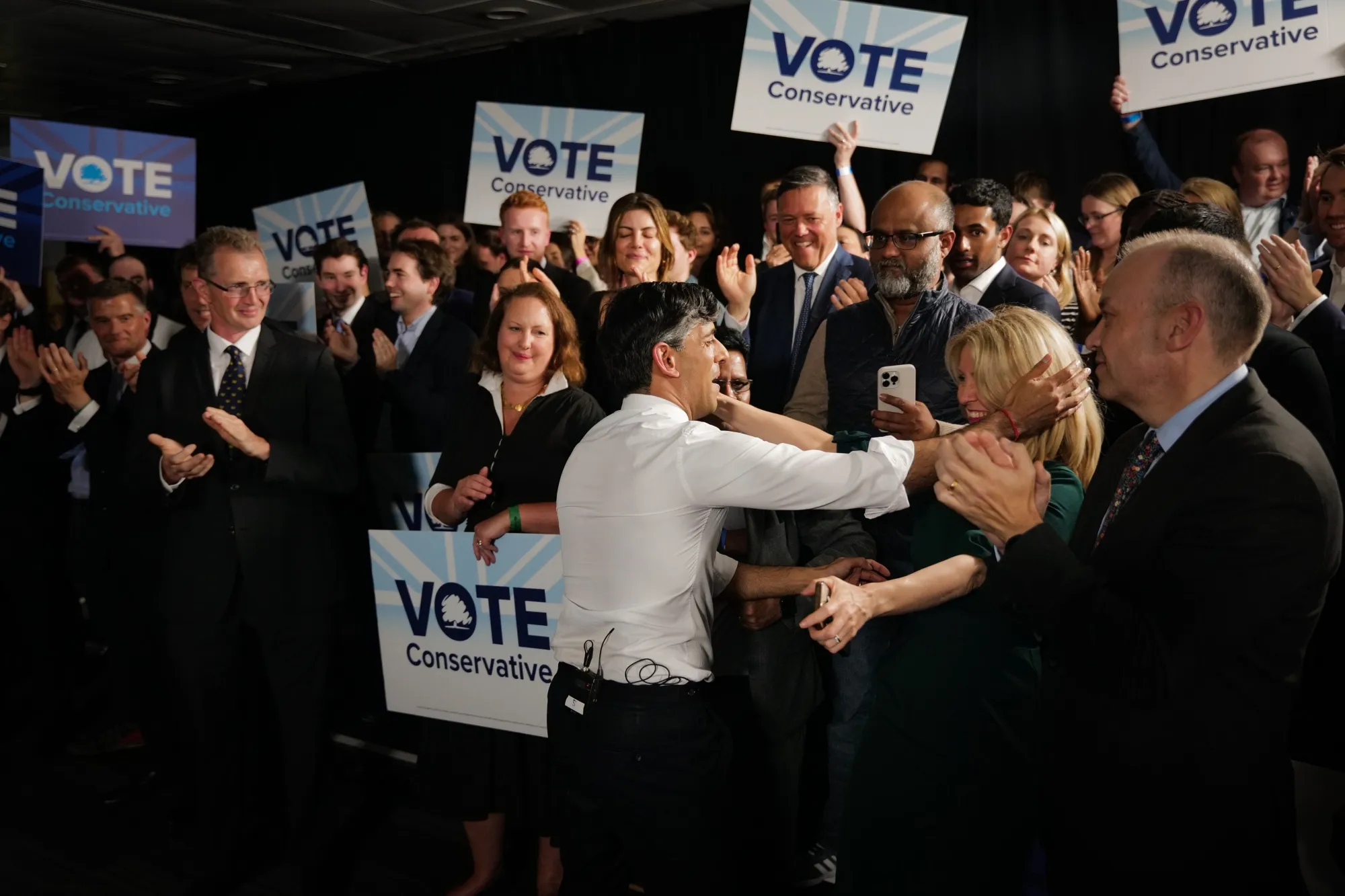 Rishi Sunak, center, greets attendees at a Conservative Party election campaign event in London on May 22.&nbsp;