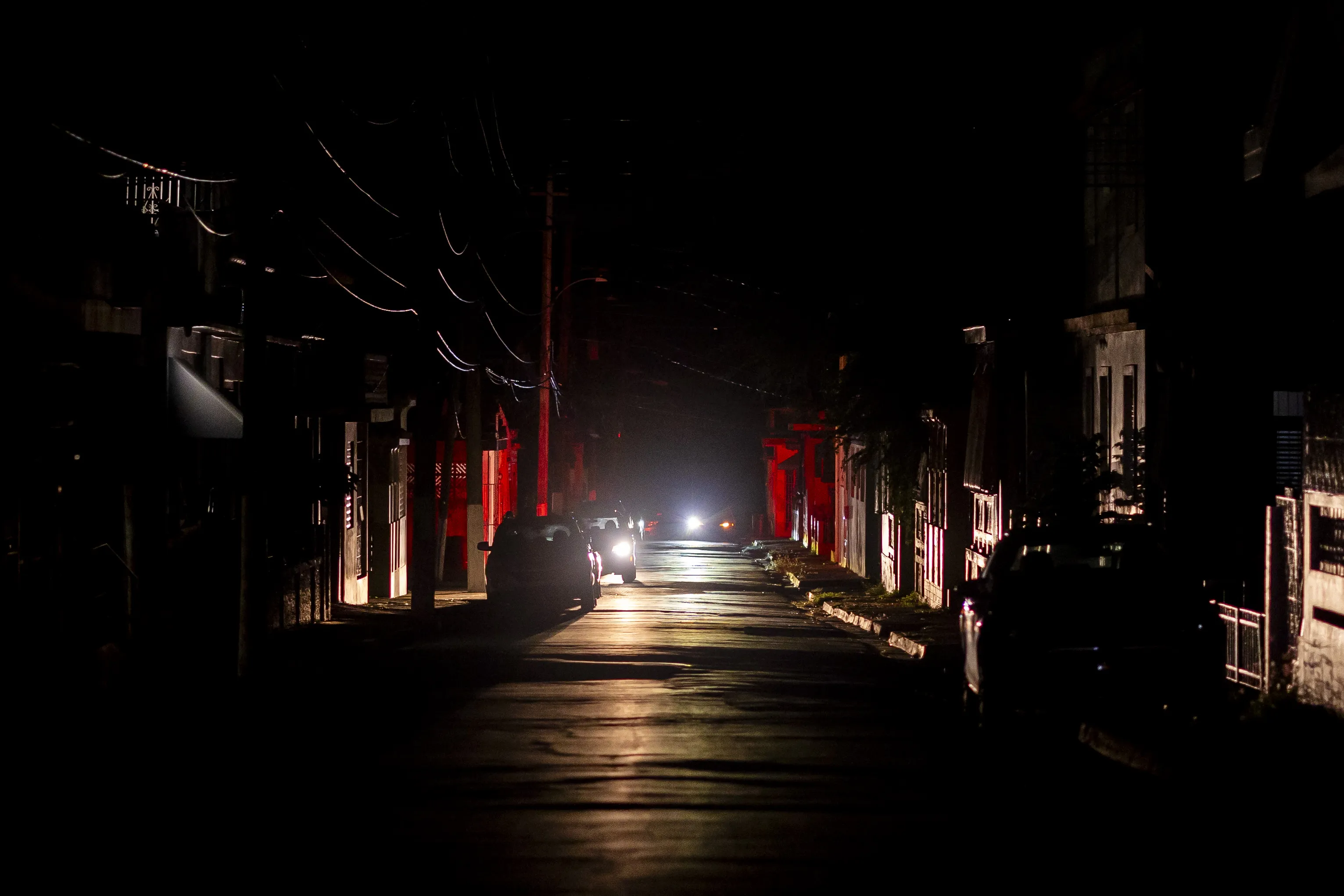 Vehicles in Guayama, Puerto Rico, during a blackout on New Year’s Eve in 2024.