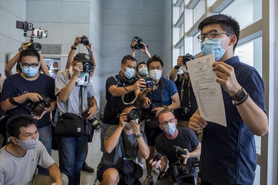 Hong Kong Moves to Crush Opposition With Candidate Ban