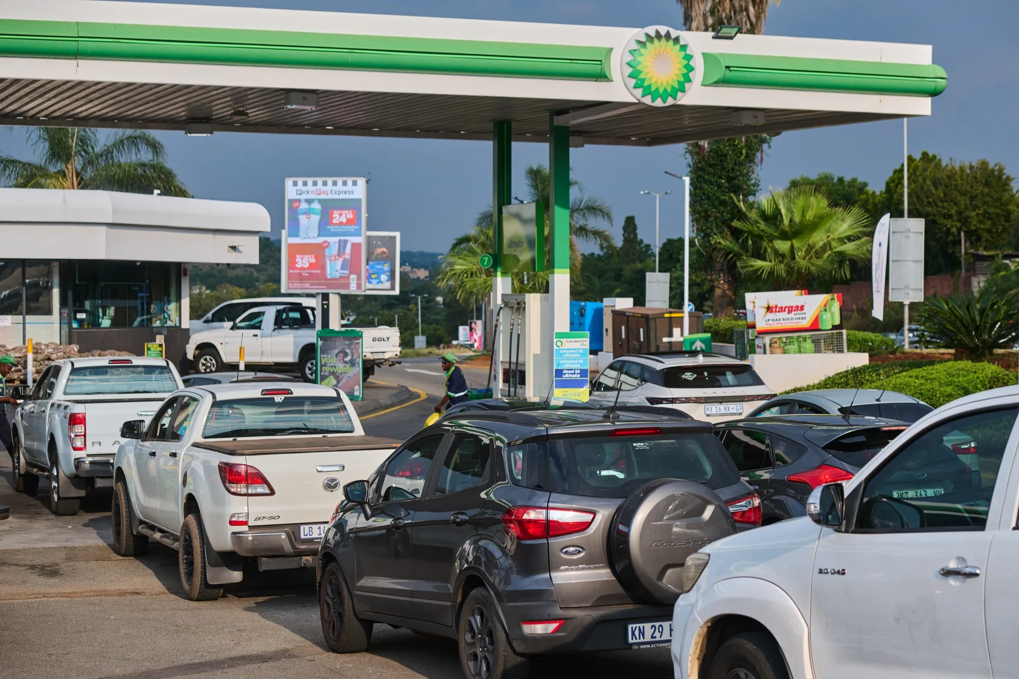 Motorists queue for fuel at a gas station in Pretoria, South Africa, on March 31.