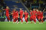 England celebrate their maiden World Cup penalty shoot-out victory.