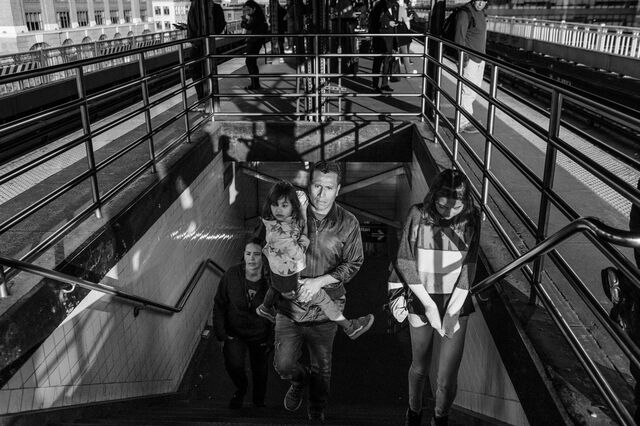 The Tonito family exit from a subway station in the Queens borough of New York, on April 26.