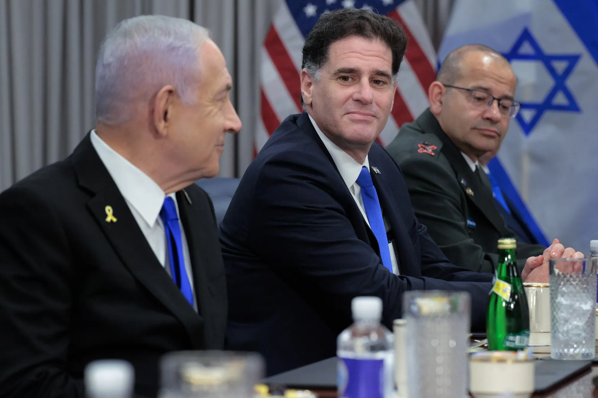 Benjamin Netanyahu, left, and Ron Dermer, center.