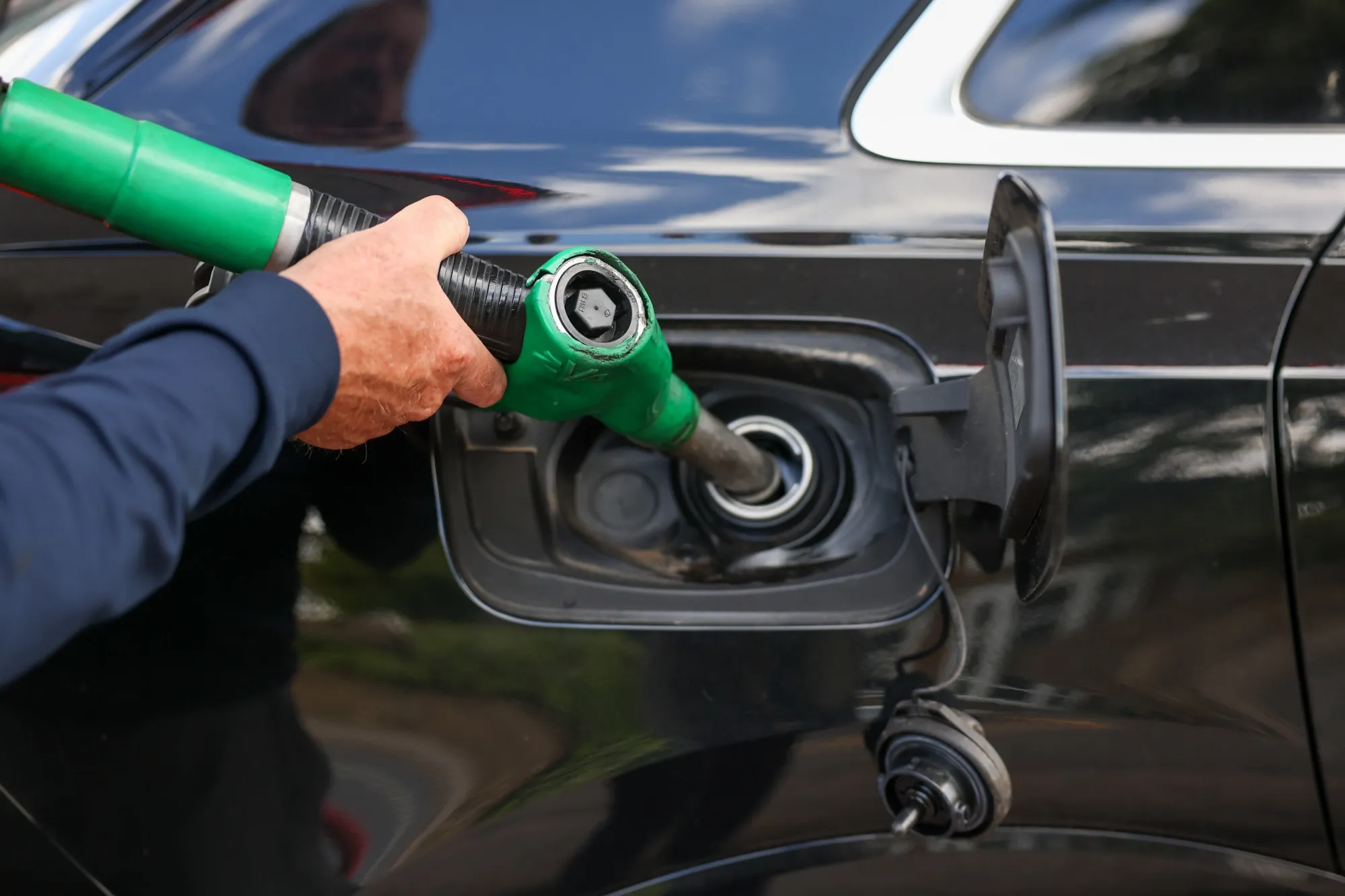 A customer fills up at a petrol station in Essex.