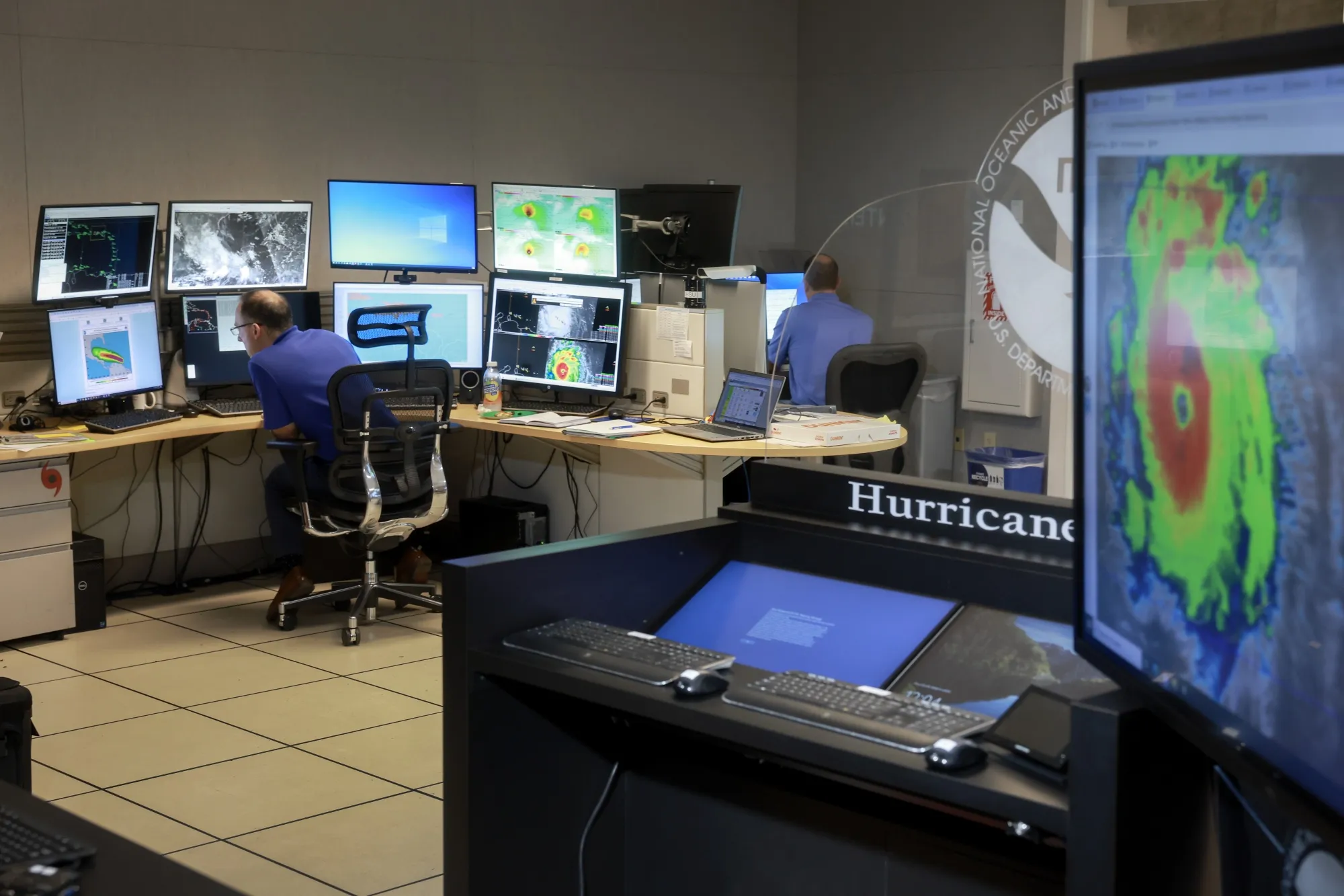 A Senior Hurricane Specialist at the National Hurricane Center works on tracking Hurricane Beryl at the National Hurricane Center in Miami, Florida, on July 1.