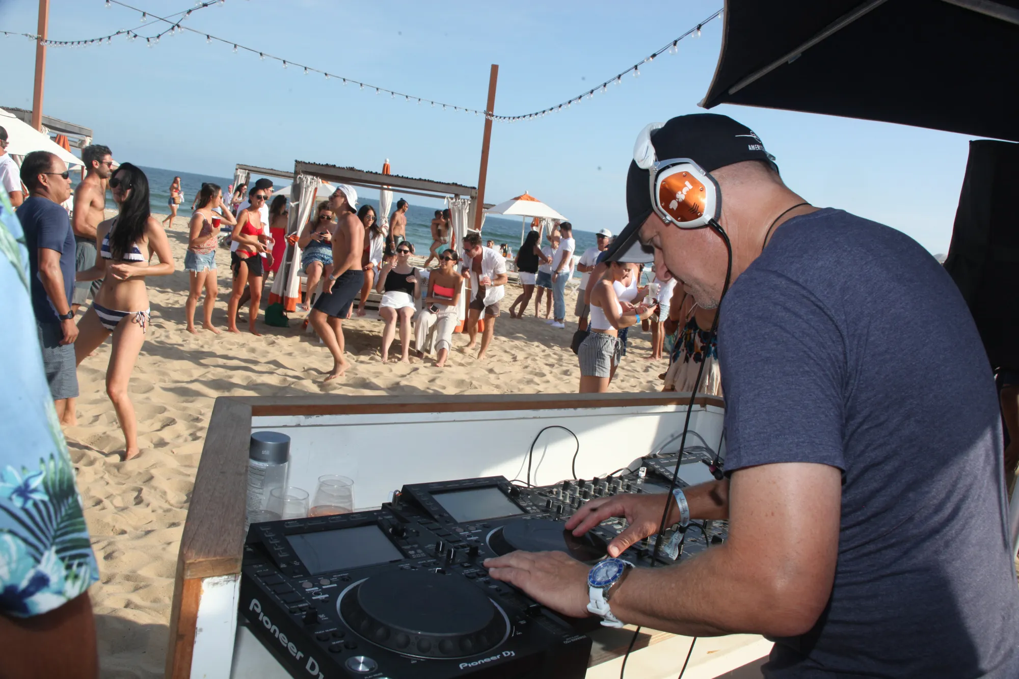 David Solomon, aka&nbsp;DJ D-Sol, spins on the beach in 2018.