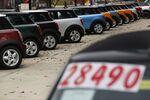 Bayerische Motoren Werke AG Mini vehicles are displayed for sale at a car dealership in Louisville, Kentucky.