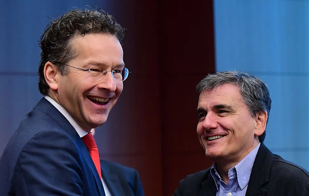 Jeroen Dijsselbloem and Euclid Tsakalotos find something to smile about.
