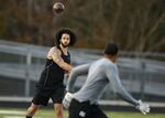 Free agent quarterback Colin Kaepernick participates in a workout for NFL football scouts and media, Saturday, Nov. 16, 2019, in Riverdale, Ga. In a tweet Sunday, March 13, 2022, Kaepernick indicated that he is seeking receivers to catch his passes and a team to sign him. (AP Photo/Todd Kirkland, File)