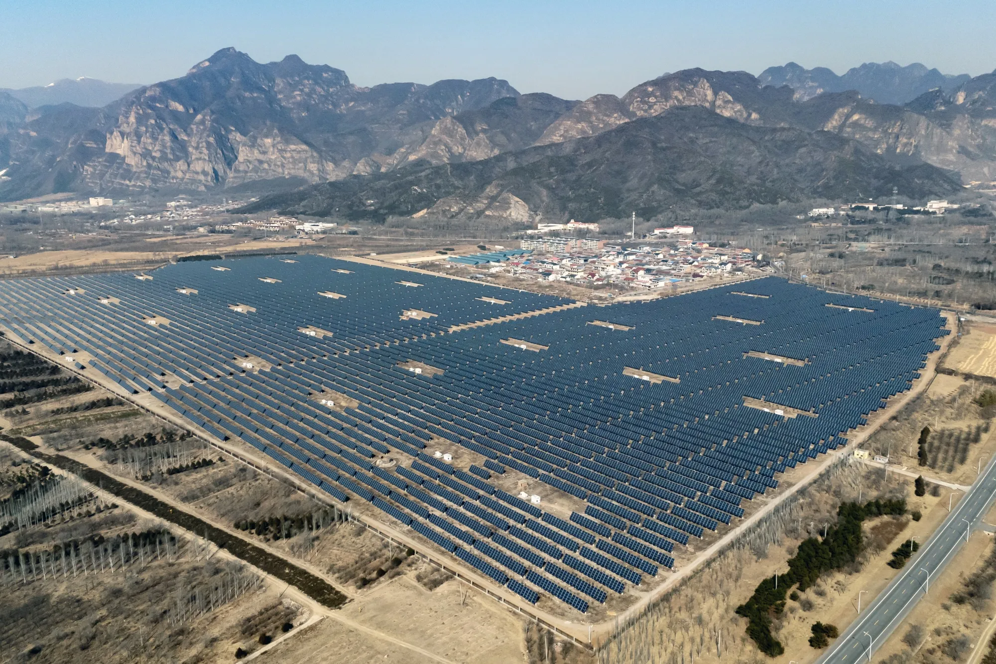 A solar&nbsp;plant near Beijing. Climate&nbsp;policies are back in favor even as China continues to burn coal.&nbsp;