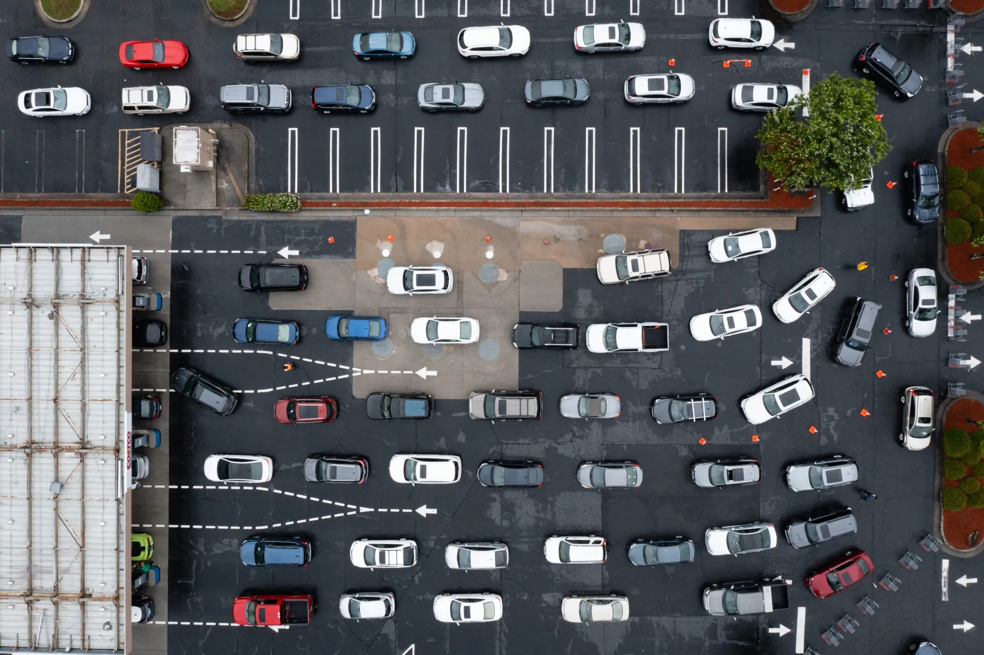 Drivers wait in line to refuel at a gas station.&nbsp;