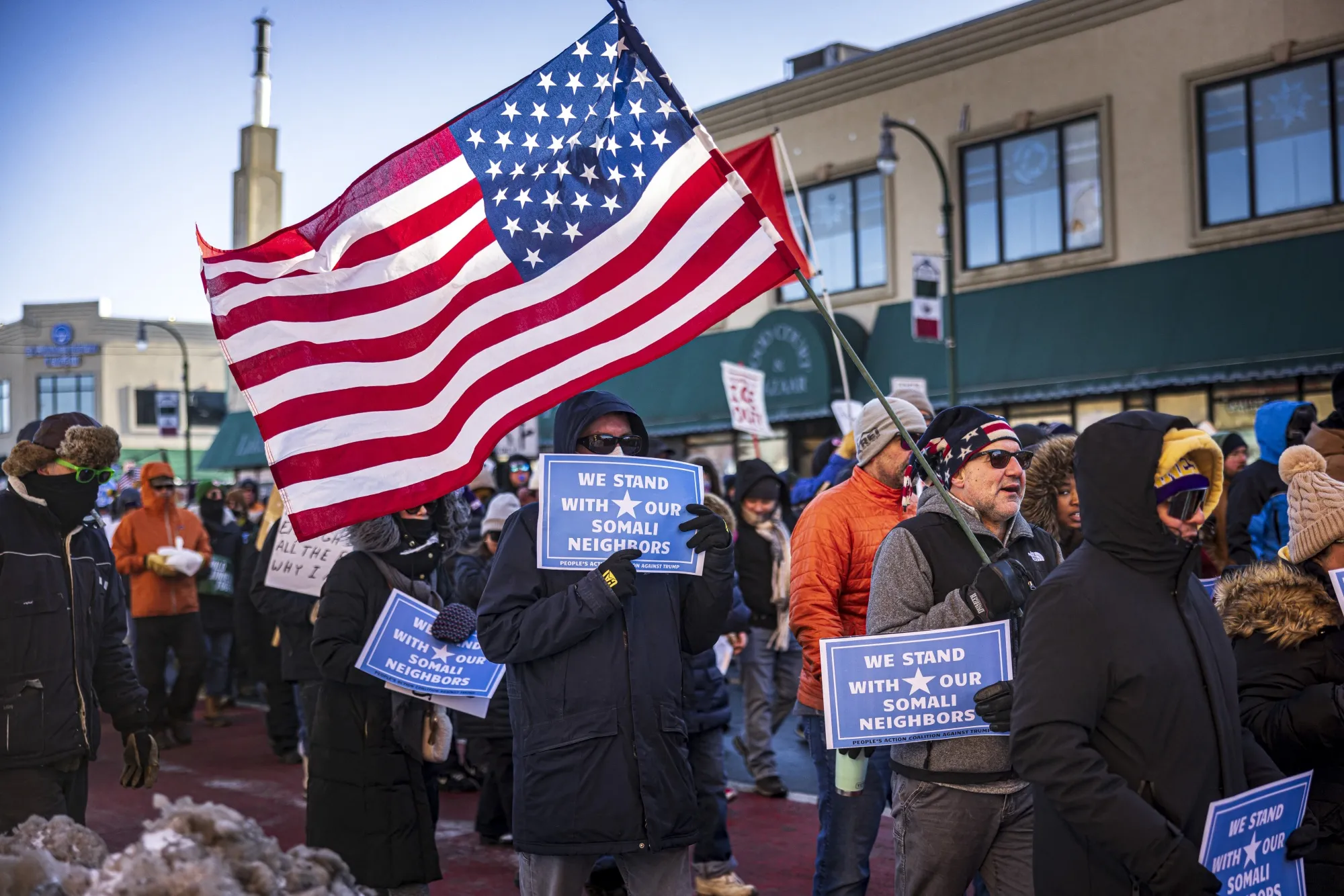 Protesters march in a neighborhood&nbsp;during a rally calling for the removal of US Immigration and Customs Enforcement officers&nbsp; in Minneapolis on Dec. 20.&nbsp;
