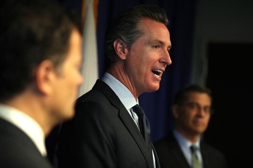 California Governor Newsom Sides With Pg E On Massive Blackout Bloomberg