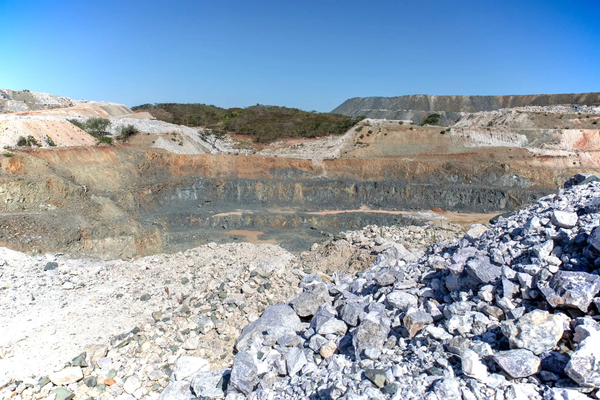 Lithium bearing rock in the open pit at the Bikita Minerals lithium mine, operated by Sinomine Resource Group Co., in Bikita, Zimbabwe.
