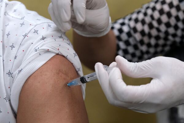 Vaccinations in New Delhi as Covid May Have Claimed as Many as 5 Million Lives in India