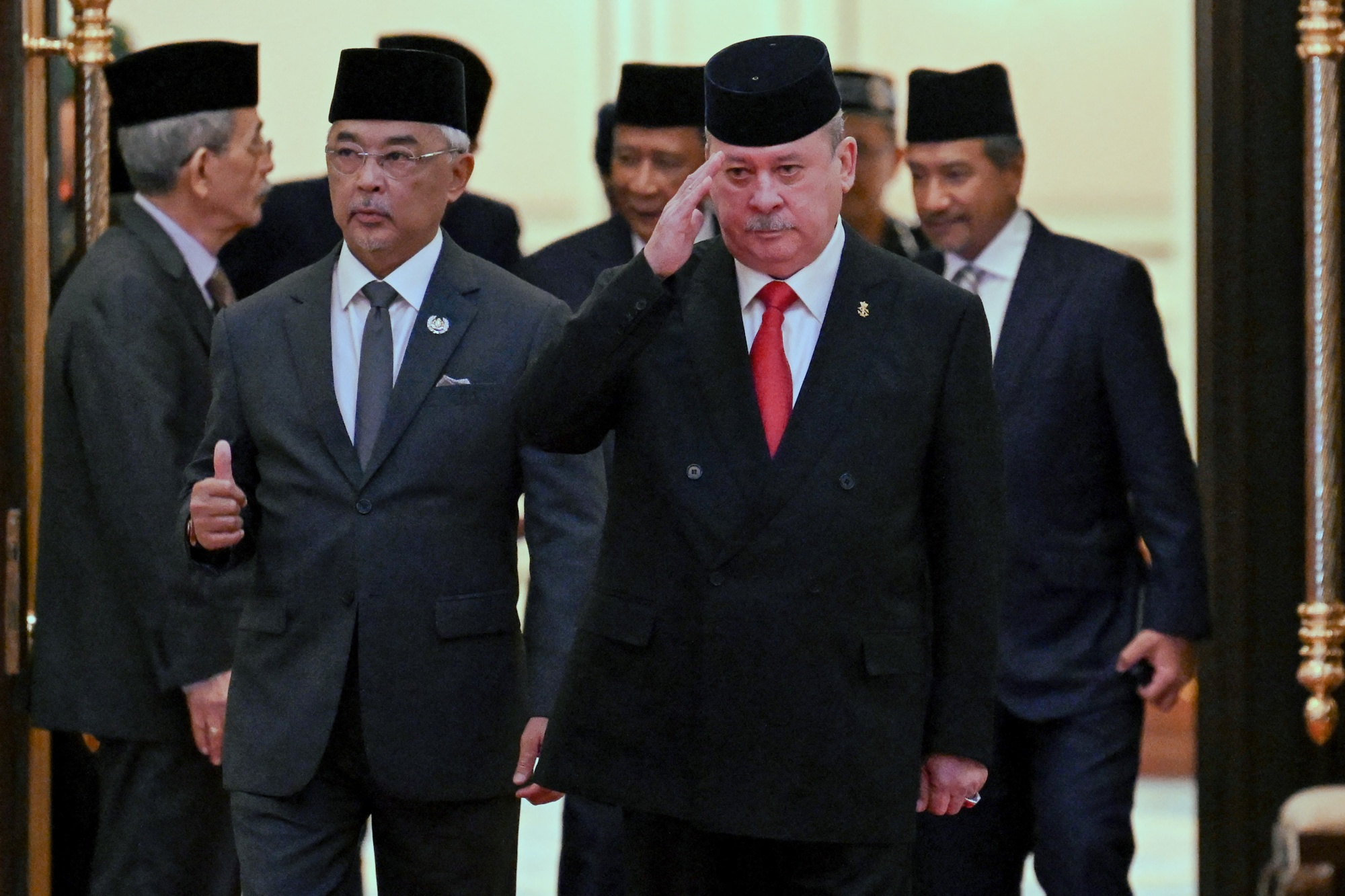 Photo of Sultan Ibrahim and Malaysia's King Abdullah side by side.