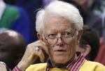 Former Fidelity Magellan fund manager Peter Lynch is seated during the second quarter of an NBA basketball game in Boston, Wednesday, Feb. 3, 2016. Boston College announced that works of art by Pablo Picasso, Mary Cassatt and Winslow Homer are among 30 pieces of art worth more than $20 million that Lynch, alumnus and legendary investment manager, is donating to Boston College's art museum. (AP Photo/Charles Krupa, File)
