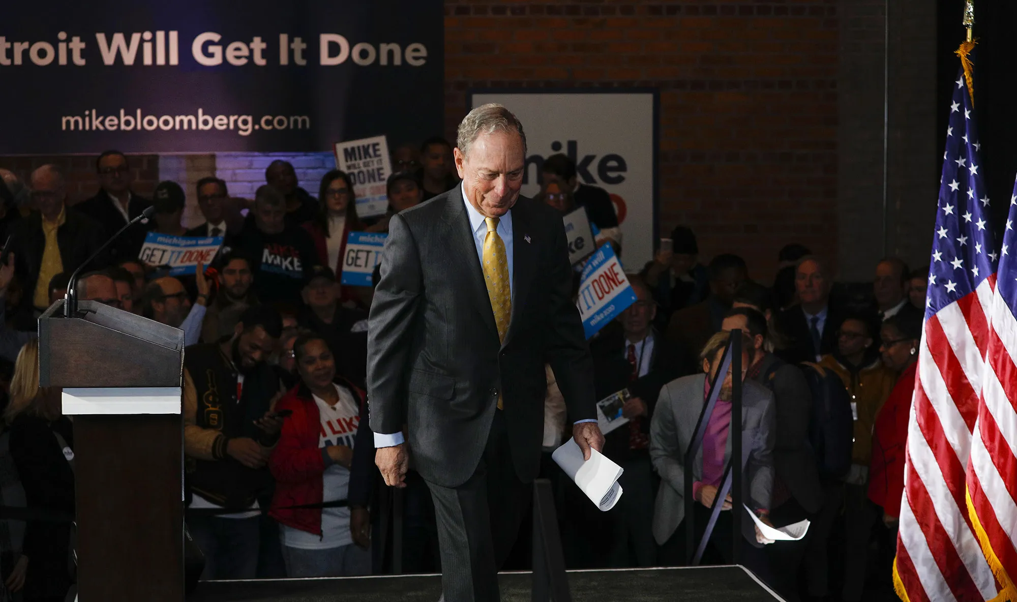 Michael Bloomberg exits the stage after a campaign event in Detroit on Feb. 4.