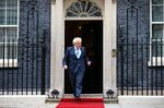 Boris Johnson prepares to greet Sebastian Pinera, Chile's president, in London on Sept. 10.