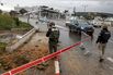 Police inspect an impact crater following a rocket attack in Safed, northern Israel, on Feb. 14.