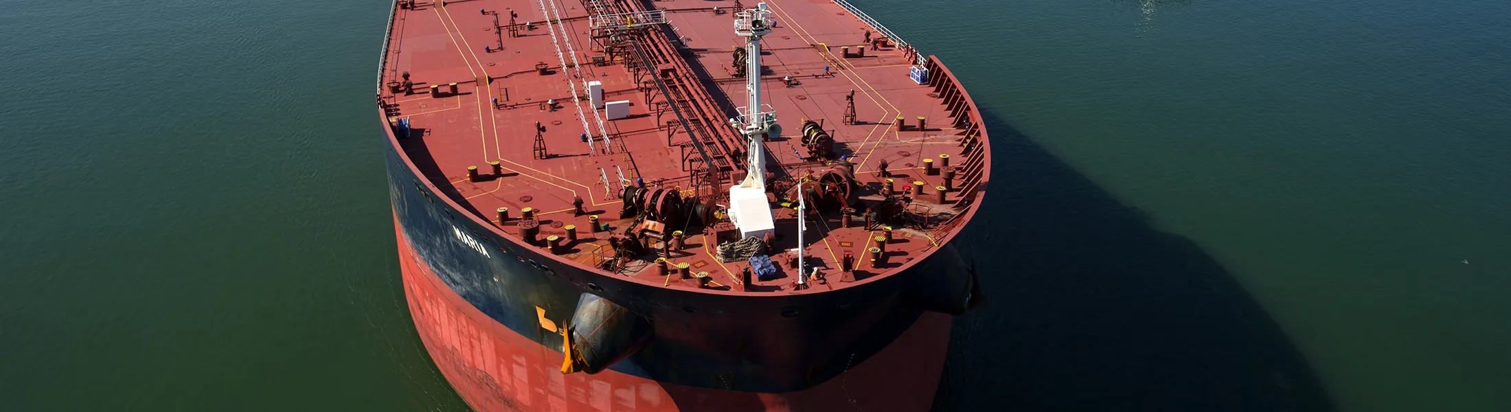 Views Of Tankers & Refineries As Oil Trades Near 12-Year Low