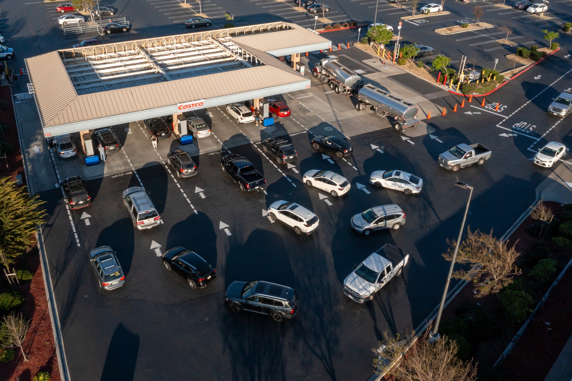 Drivers wait to refuel vehicles at a gas station in Richmond, California.