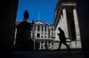 A pedestrian passes the Bank of England (BOE) in the City of London.