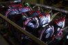 A cryptocurrency mining rig composed of Asus Strix machines operates at the SberBit mining 'hotel' in Moscow, Russia.