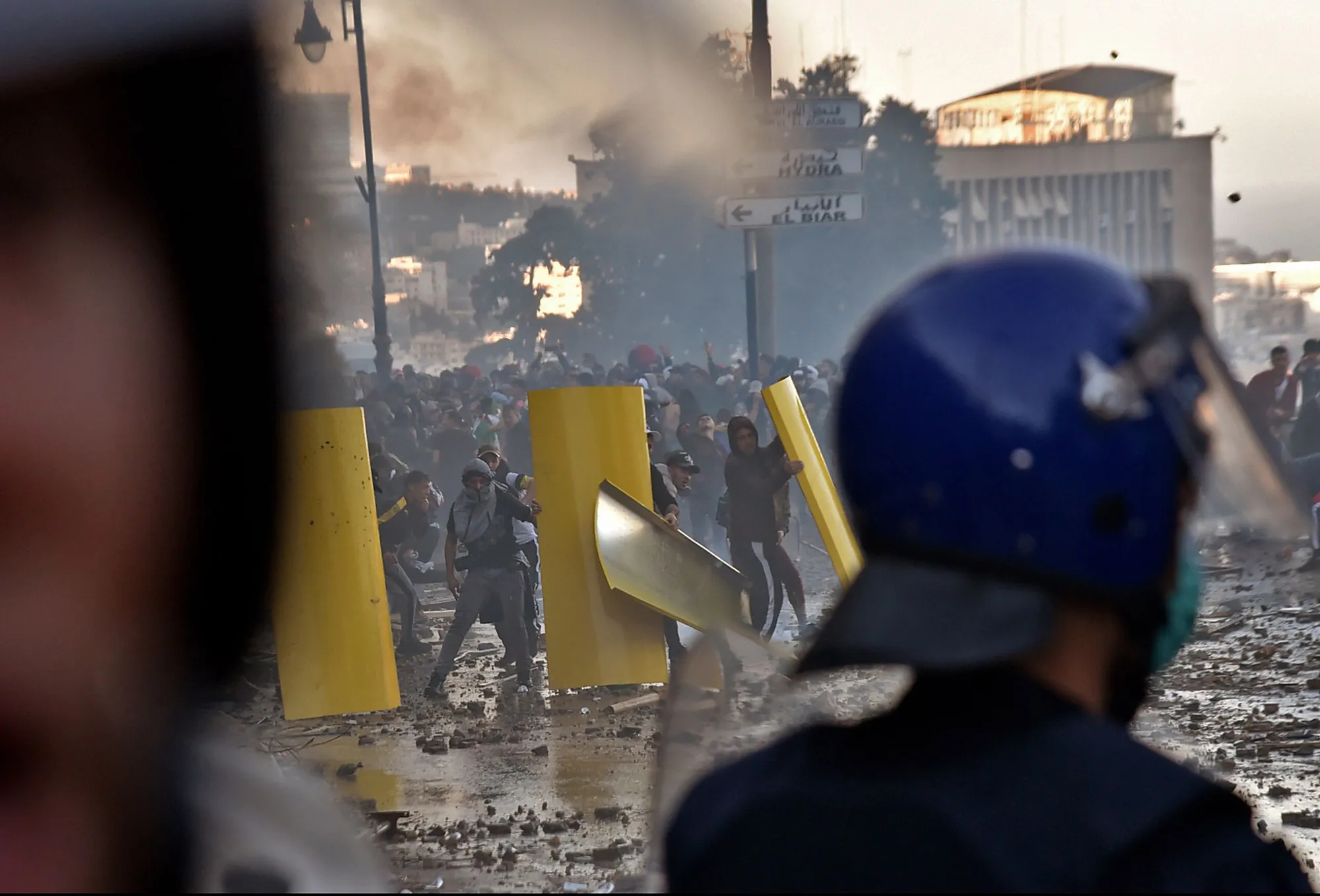 Protesters clash with security forces in Algiers on March 1.