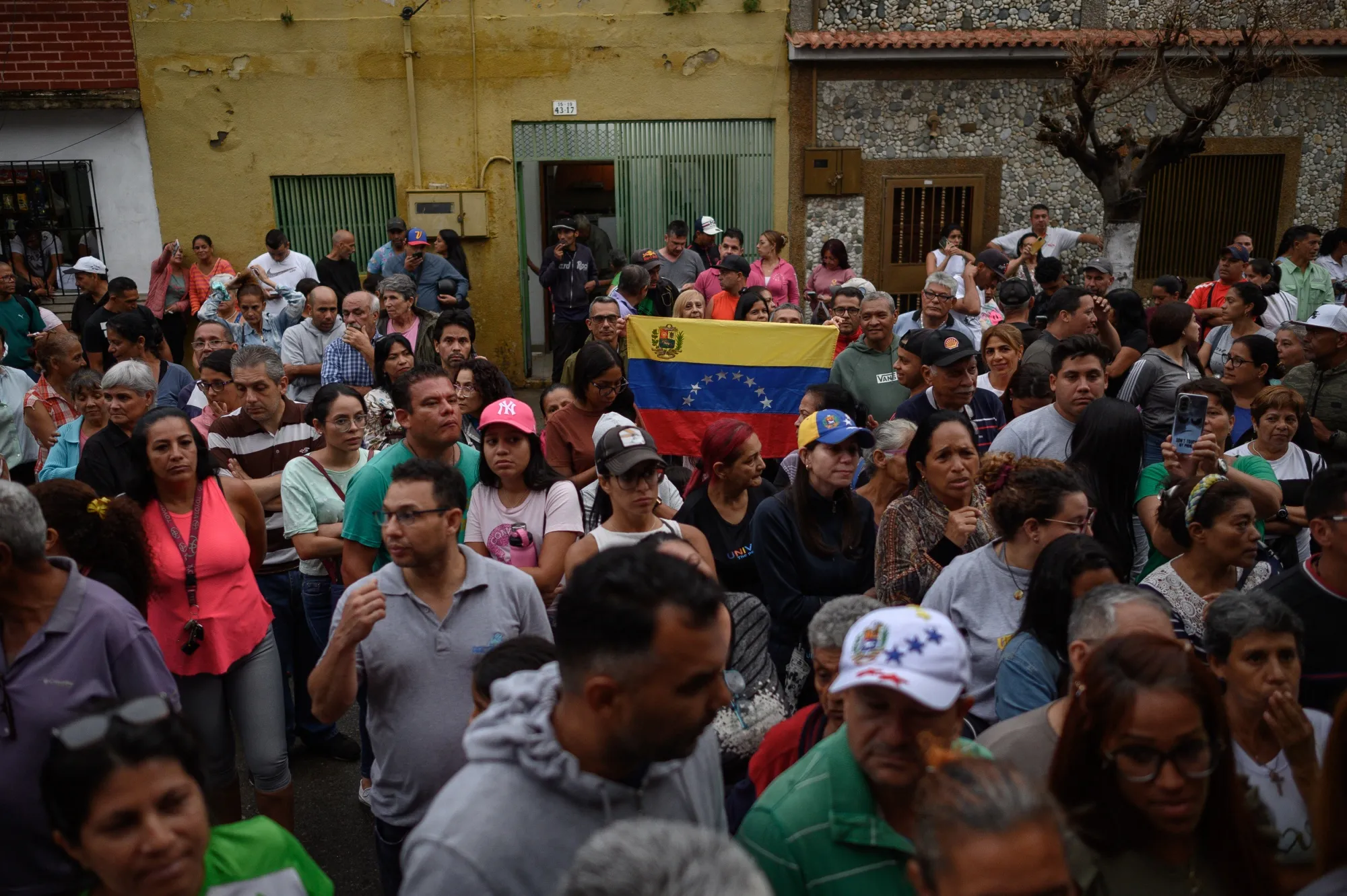 Voters wait in line to cast ballots at a polling station during the opposition primaries in Caracas&nbsp;on Sunday.