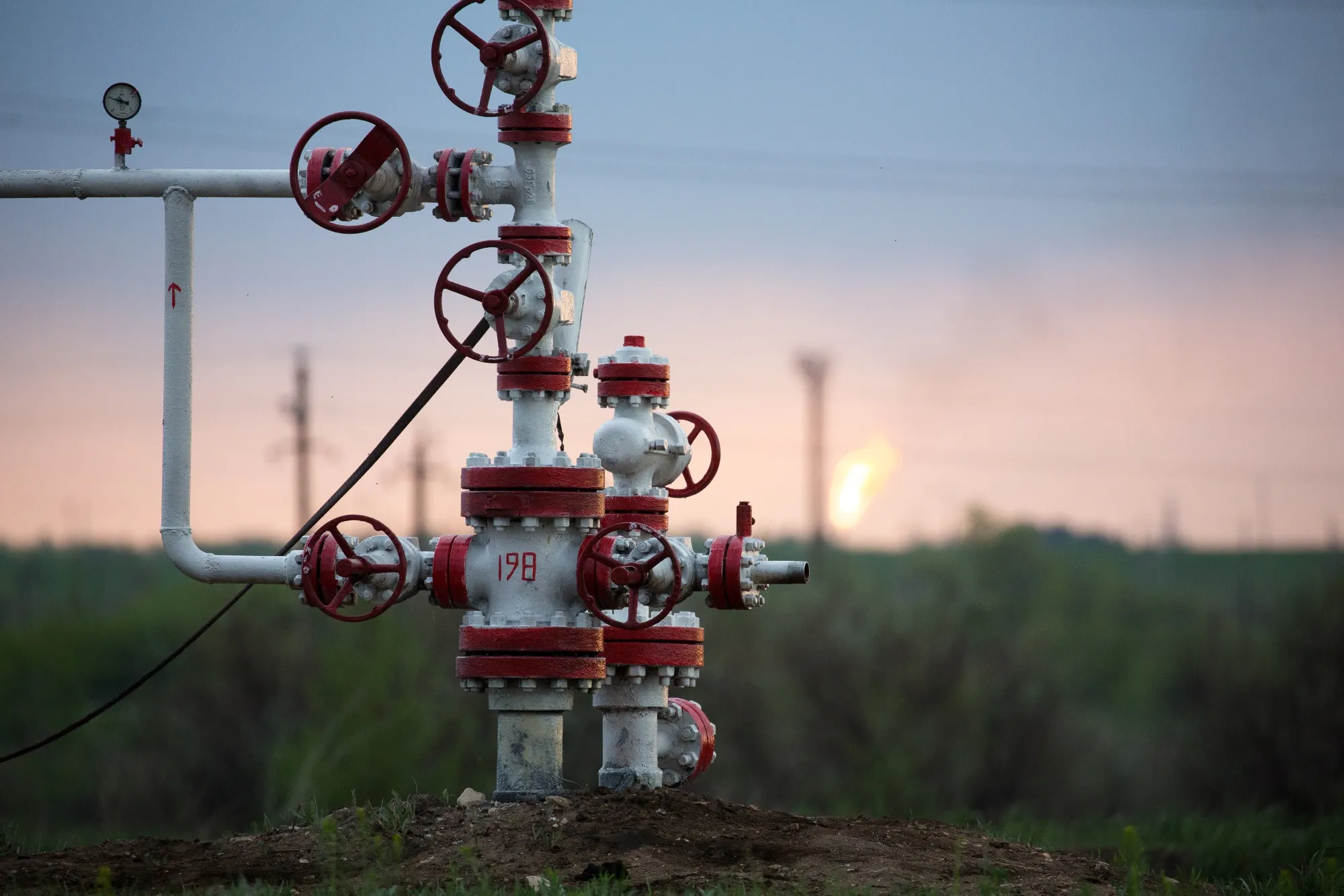 Valve wheels sit on crude oil pipework in an oil field near Samara, Russia, on Tuesday, May 14, 2019.&nbsp;