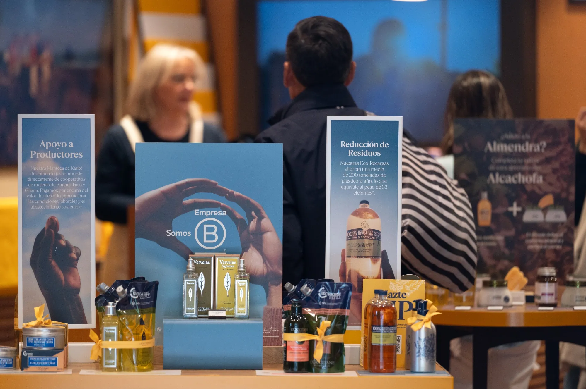Beauty products for sale inside a L'Occitane store in Madrid.