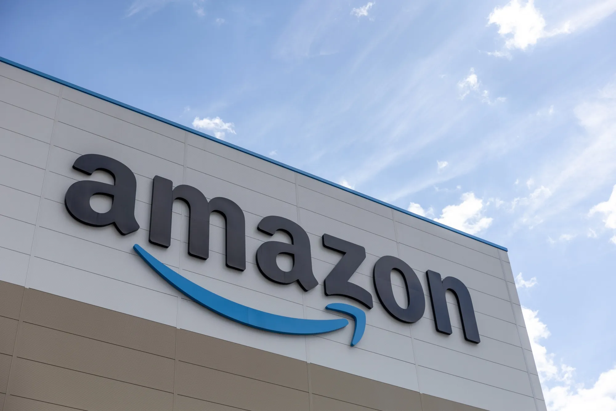 アマゾン・ドット・コムのロゴ　