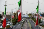 National flags of Iran fly above Azadi avenue in Tehran, on Nov. 3.