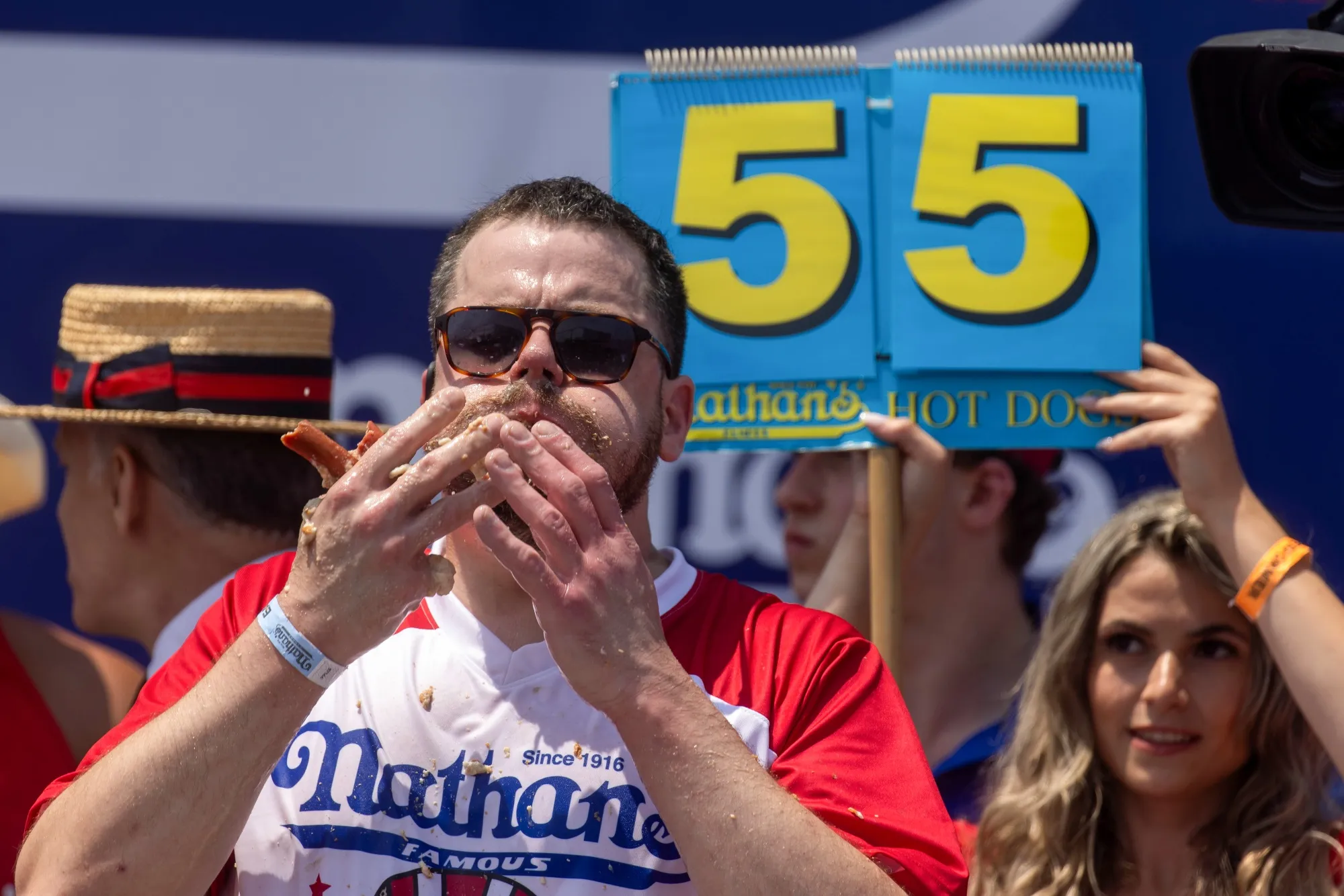 Patrick Bertoletti competes in the Nathan's Famous International Hot Dogs Eating Contest at Coney Island in Brooklyn on July 4, 2024.