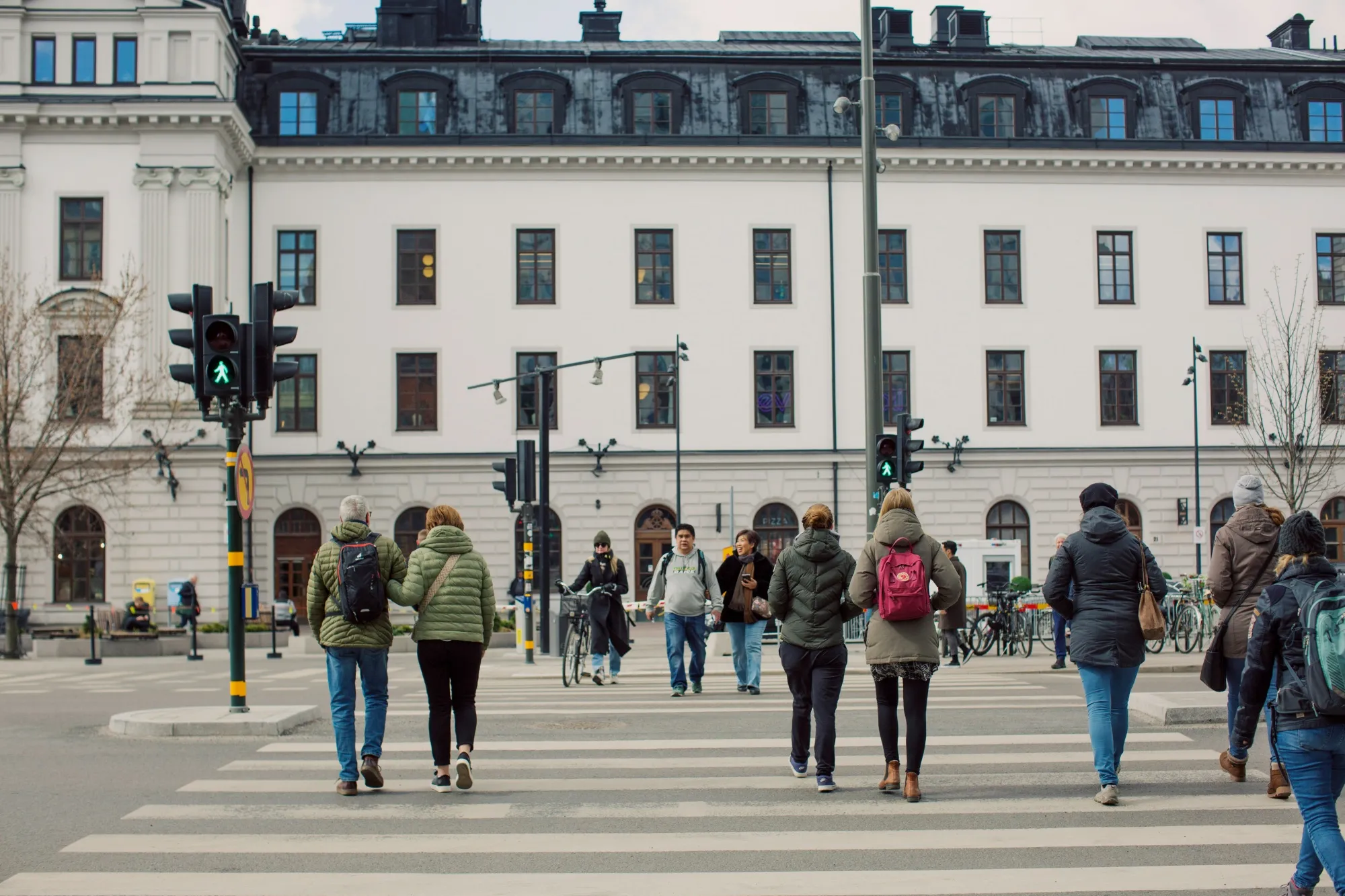 Pedestrians on a crossing near the Central Railway Station in Stockholm.