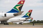 South African Airways jets on the runway.