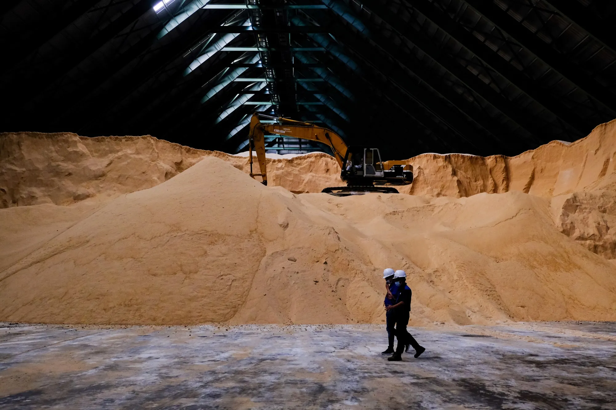 Stockpiles of raw sugar.