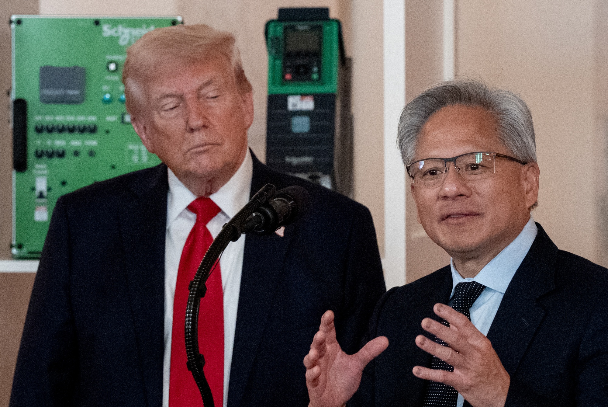 President Donald Trump, left, and Nvidia Corp. CEO Jensen Huang at the White House in April 2025, for the “Invest in America” event.